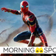 Peter Parker in his Iron Spider Suit crouches ready for battle as the metal arms of Alfred Molina's Doc Ock reach out at him.